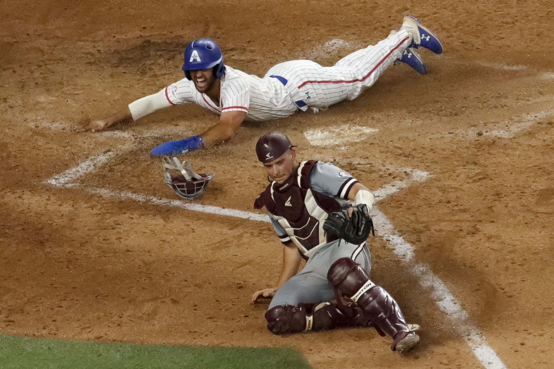 Photos: Mavericks lose 8-4 against Texas A&M University despite early lead